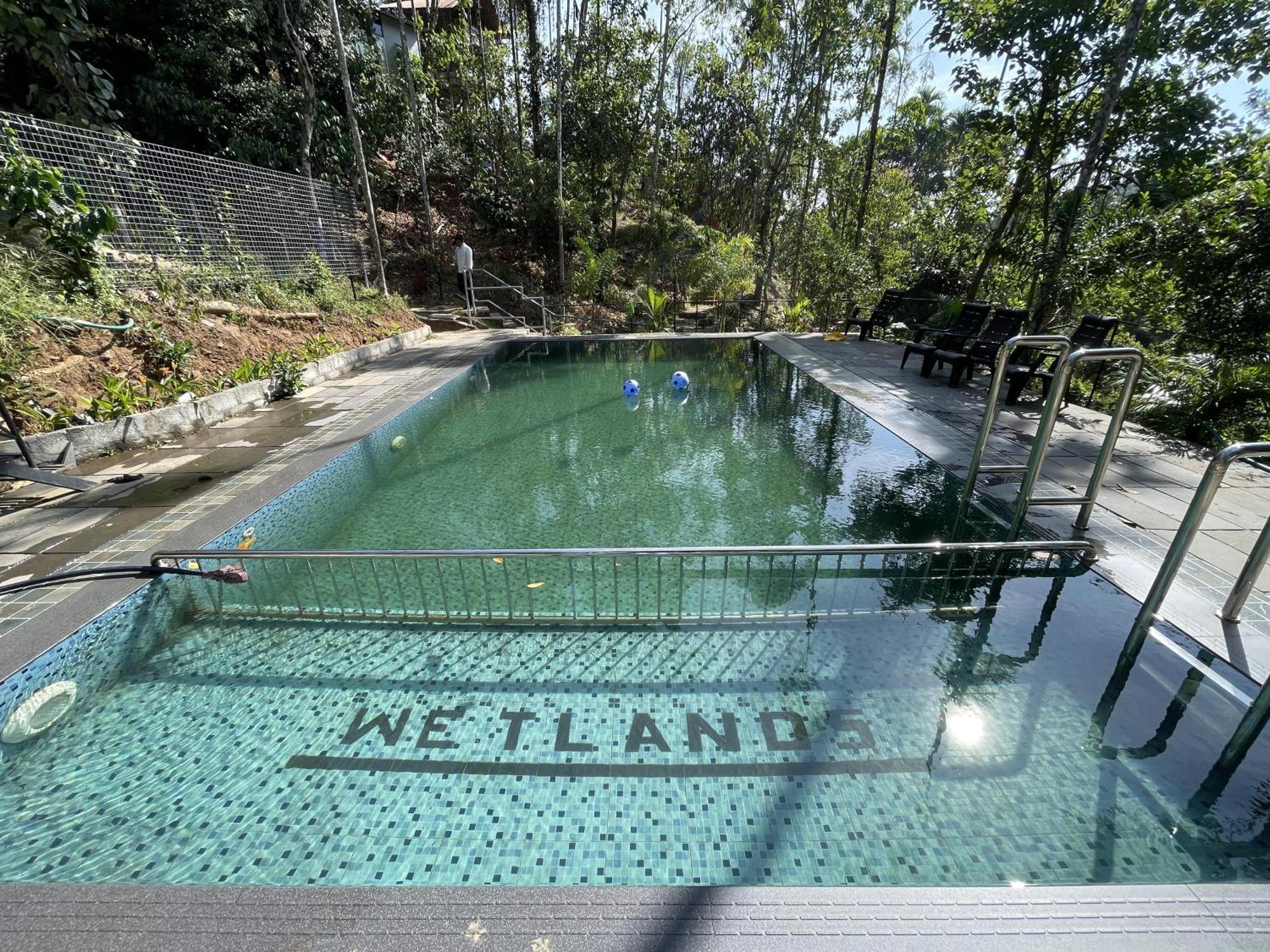 Wetlands Wayanad Pool Resort With Natural Waterfalls Padinjarathara Exterior photo