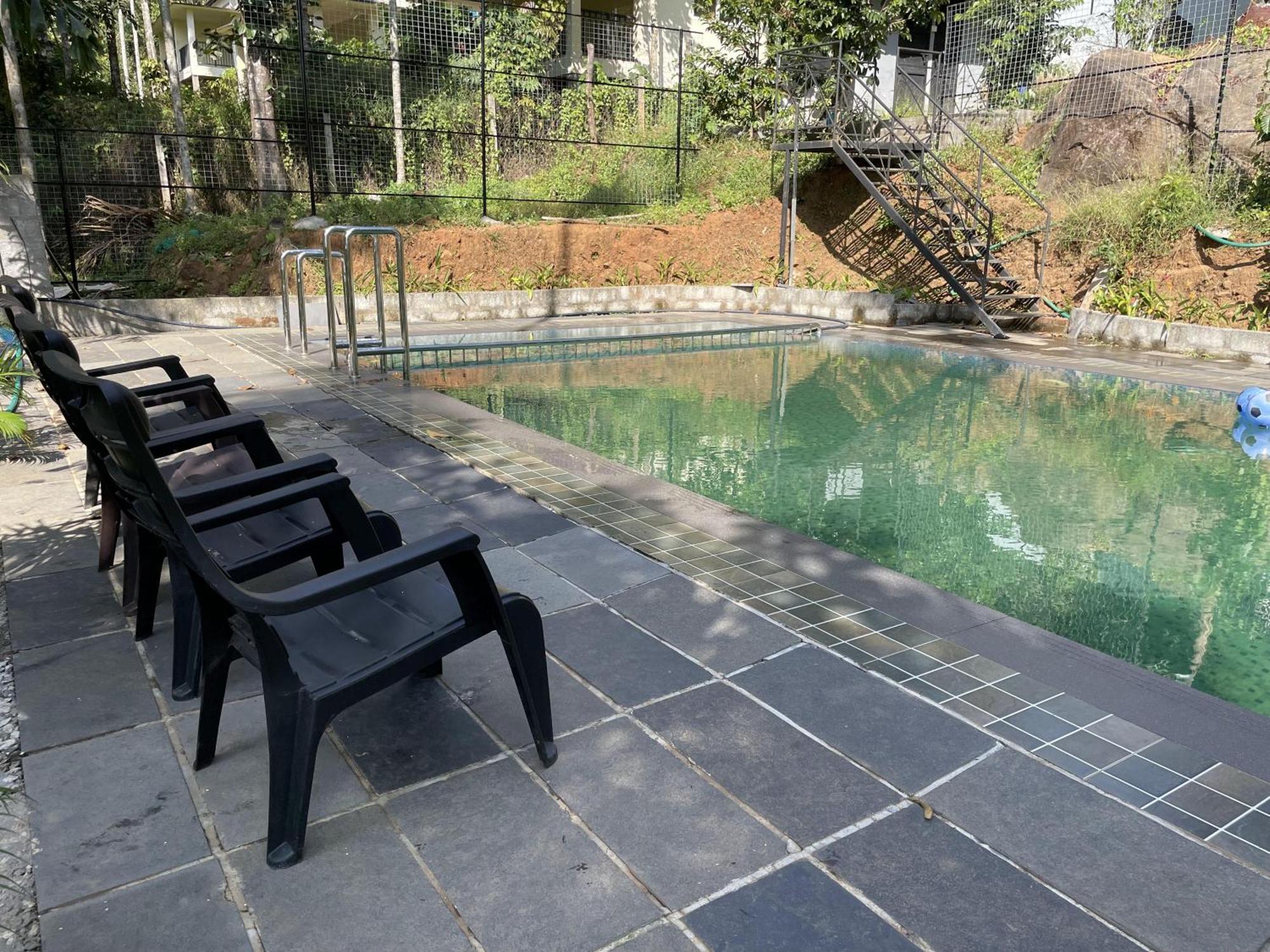 Wetlands Wayanad Pool Resort With Natural Waterfalls Padinjarathara Exterior photo