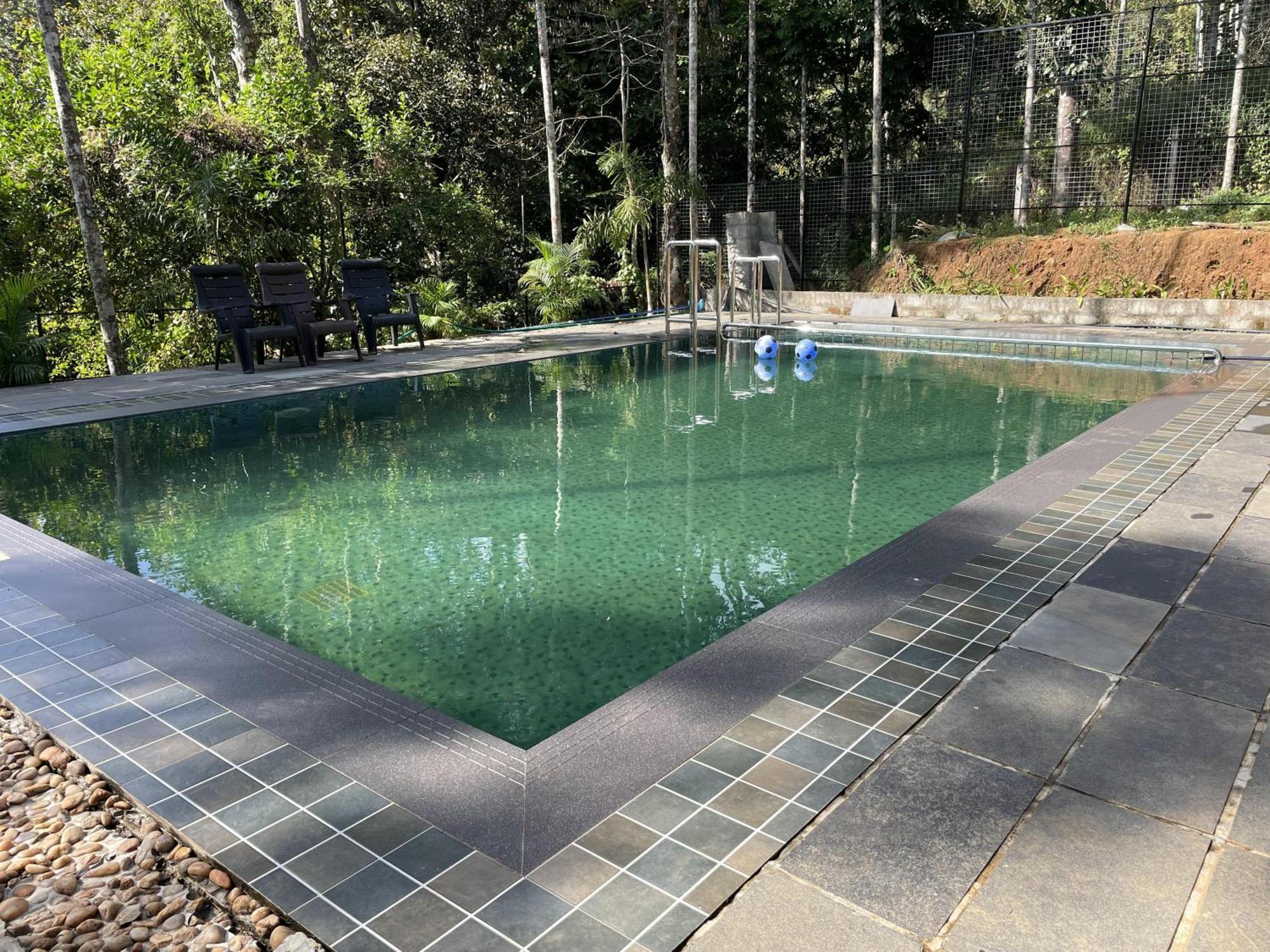 Wetlands Wayanad Pool Resort With Natural Waterfalls Padinjarathara Exterior photo